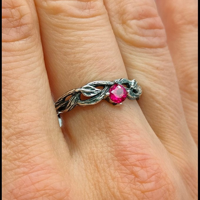 Scarlet Enchantment: Gothic Ruby Ring with Twisted Band