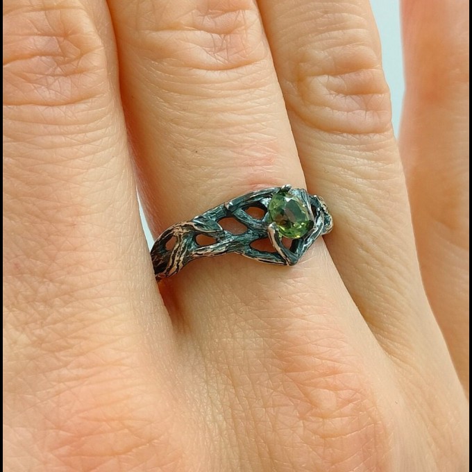 Enchanted Gothic Peridot Ring with Leaf Motif