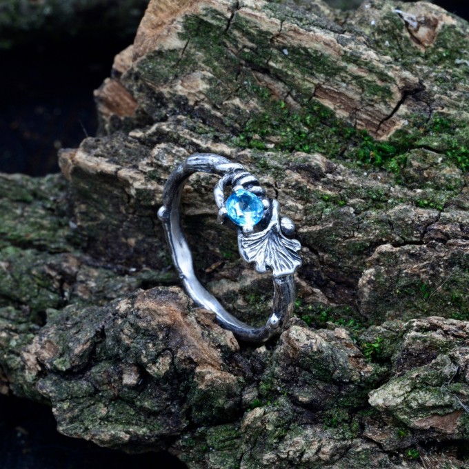 Gothic Silver Ring with a Radiant Blue Topaz