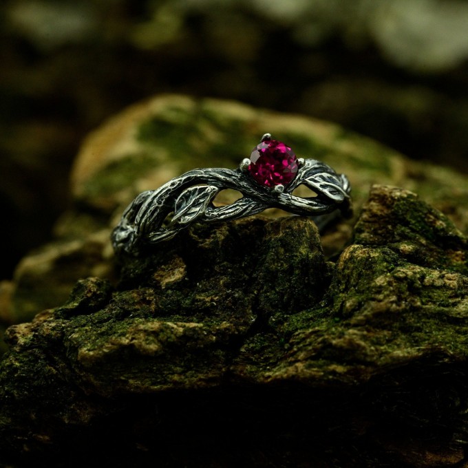 Scarlet Enchantment: Gothic Ruby Ring with Twisted Band