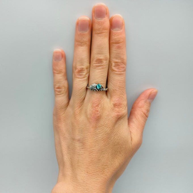 Gothic Silver Ring with a Radiant Blue Topaz