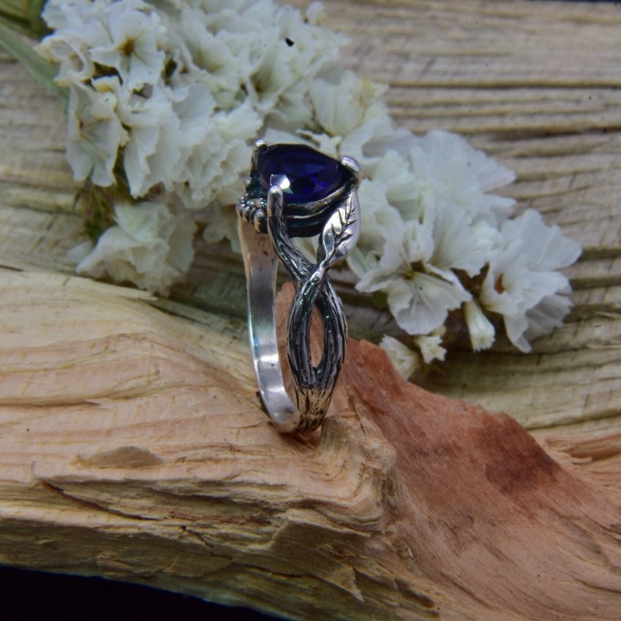 Elegant Gothic Ring with Sapphire and Intricate Design