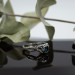 Wings of Serenity: Gothic Sterling Silver Ring with Blue Topaz