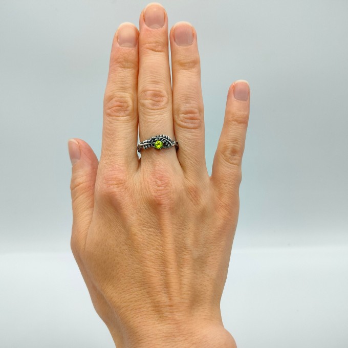 Guardian's Vine: Gothic Sterling Silver Ring with Olivine Gemstone