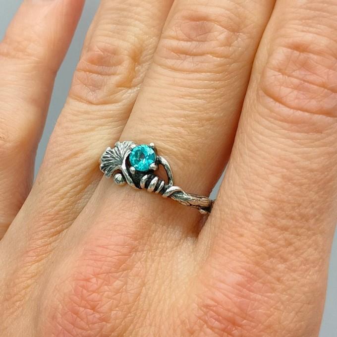 Gothic Silver Ring with a Radiant Blue Topaz