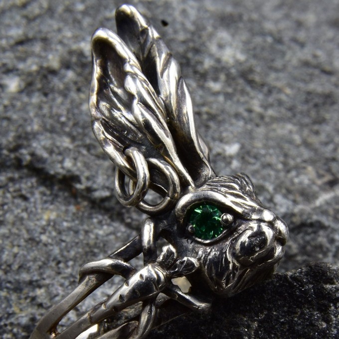 Gothic Emerald Ring with Enchanted Flame Motif