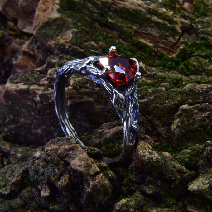 Gothic Garnet Ring with Elegant Twisting Motif