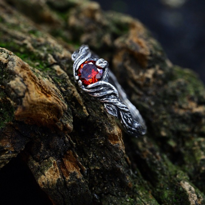 Gothic Silver Ring with Garnet and Feather Motif