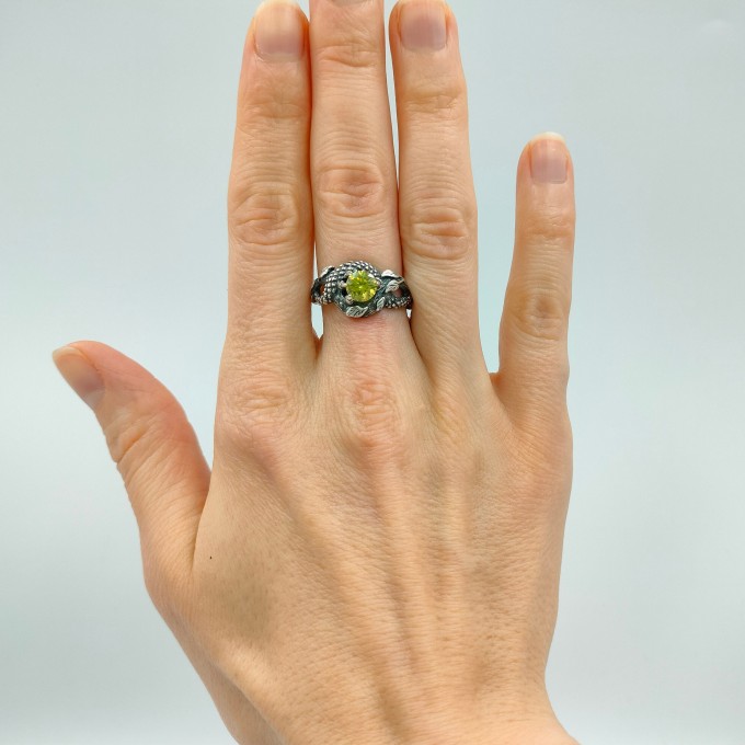 Guardian of Nature: Sterling Silver Ring with a Vibrant Olivine Gem