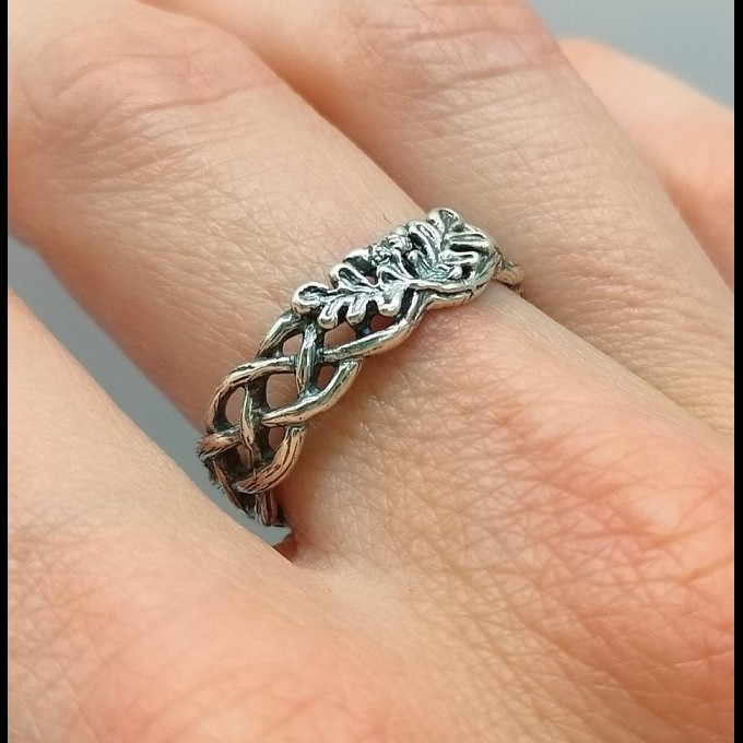 Delicate Silver Band with Intricate Weaving Design