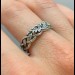 Delicate Silver Band with Intricate Weaving Design