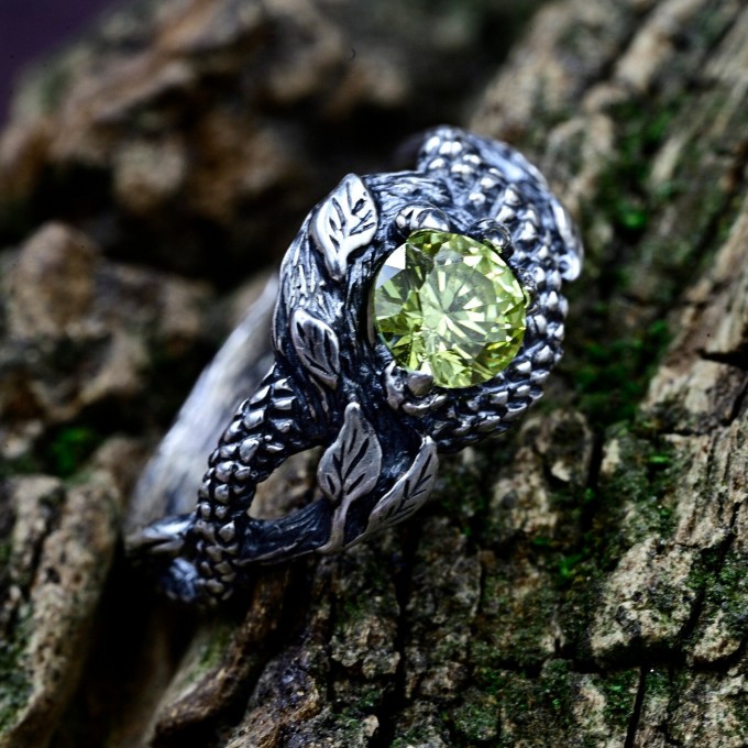 Guardian of Nature: Sterling Silver Ring with a Vibrant Olivine Gem