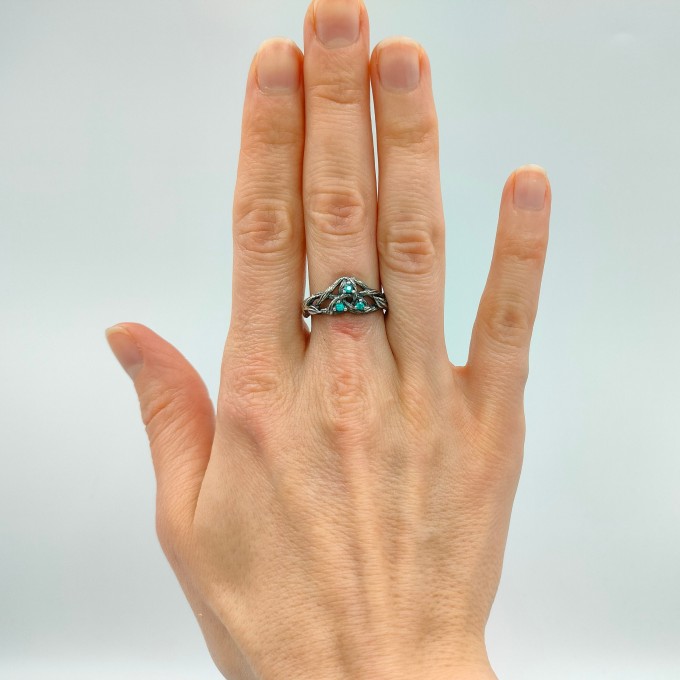Intricate Gothic Ring with Blue Topaz Accents