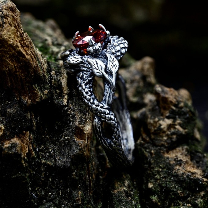 Silver Ring with Dragon Claw and Garnet Design