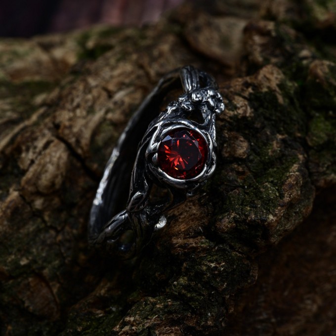 Gothic Silver Ring with Garnet and Intricate Design