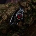 Gothic Silver Ring with Garnet and Intricate Design