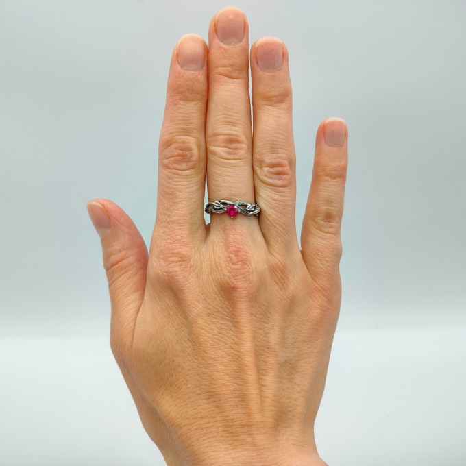 Scarlet Enchantment: Gothic Ruby Ring with Twisted Band