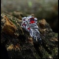 Infernal Bloom: Gothic Sterling Silver Ring with Garnet Accents