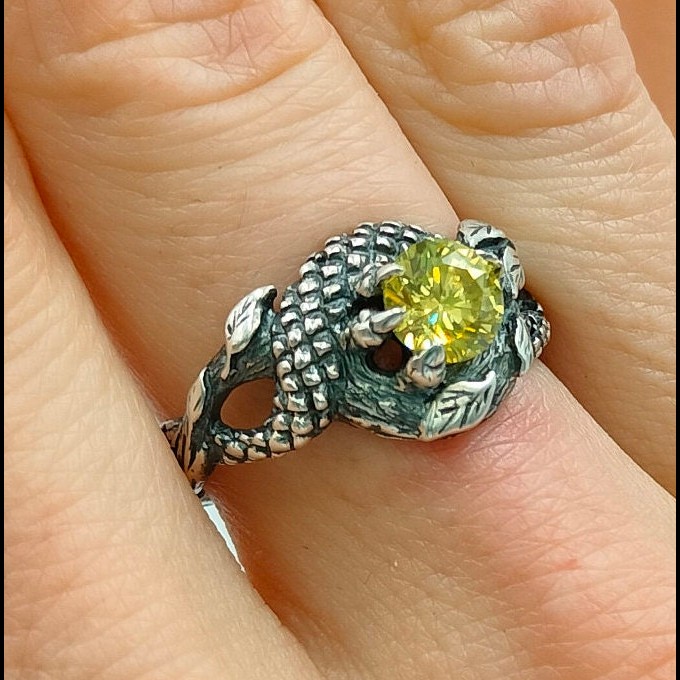Guardian of Nature: Sterling Silver Ring with a Vibrant Olivine Gem