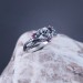 Skull of Destiny: Gothic Sterling Silver Ring with Fiery Garnets
