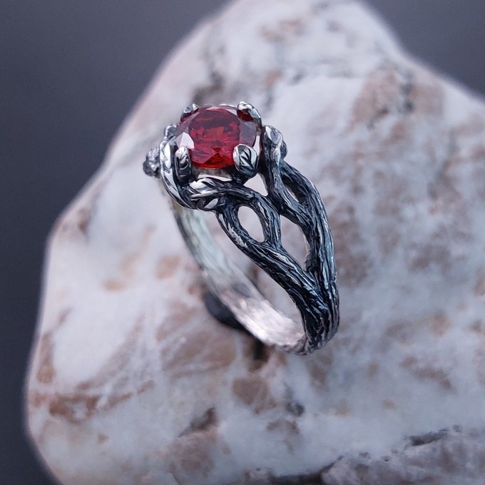 Garnet Bloom: Sterling Silver Ring with a Radiant Scarlet Gem