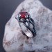 Garnet Bloom: Sterling Silver Ring with a Radiant Scarlet Gem
