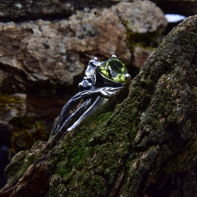 Gothic Silver Ring with a Vibrant Olivine Gemstone