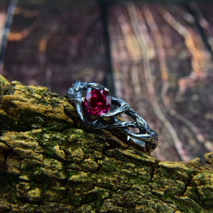 Intricate Silver Ring with Vibrant Ruby Gemstone