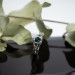 Wings of Serenity: Gothic Sterling Silver Ring with Blue Topaz