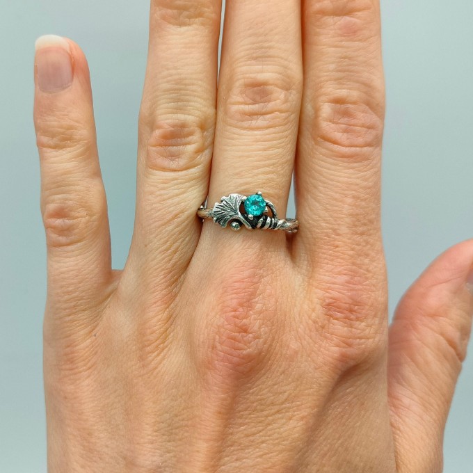 Gothic Silver Ring with a Radiant Blue Topaz