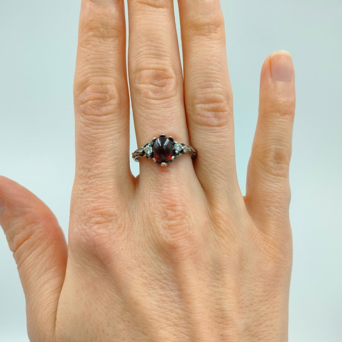 Gothic Garnet Ring with Bold Claw Design