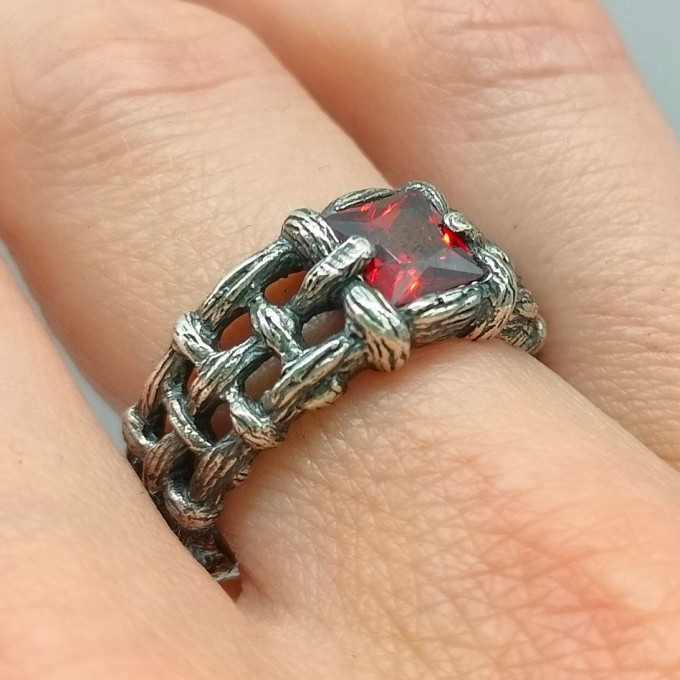 Bold Gothic Ring with Interwoven Chains and Garnet