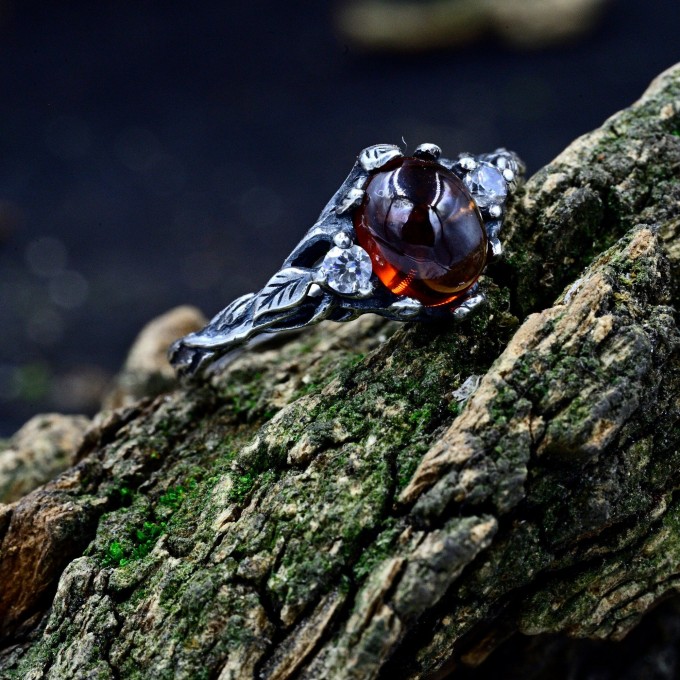 Handcrafted Silver Ring Featuring a Fiery Garnet