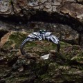 Silver Ring with Emerald and Leaf Design