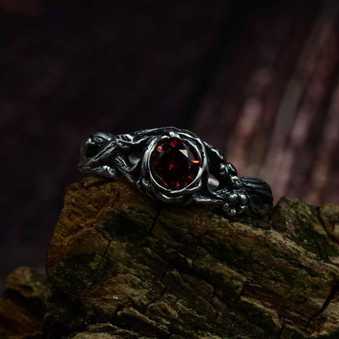 Gothic Silver Ring with Garnet and Intricate Design