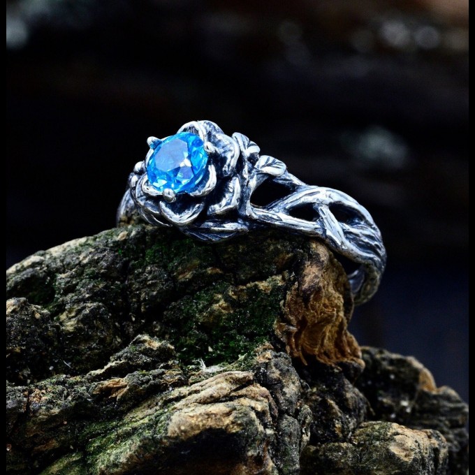 Gothic Aquamarine Ring with Intricate Nature Motif