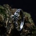 Gothic Silver Ring with Emerald and Floral Design