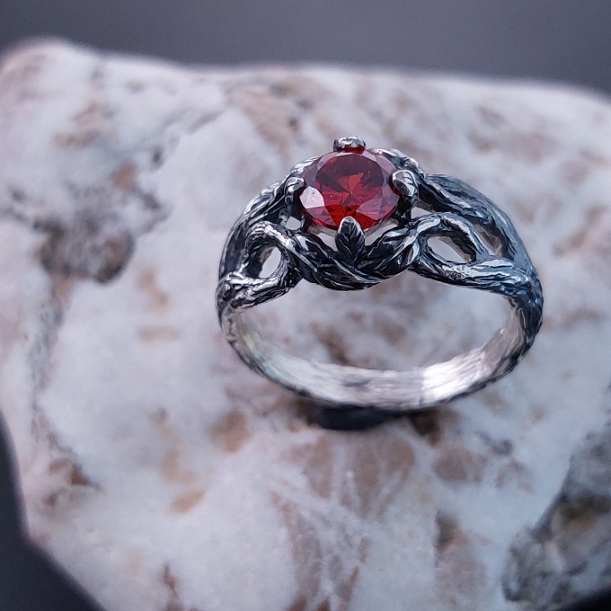 Garnet Bloom: Sterling Silver Ring with a Radiant Scarlet Gem