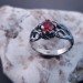 Garnet Bloom: Sterling Silver Ring with a Radiant Scarlet Gem