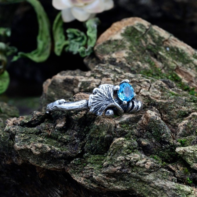 Gothic Silver Ring with a Radiant Blue Topaz
