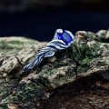 Gothic Sapphire Ring with Enchanted Twisting Motif