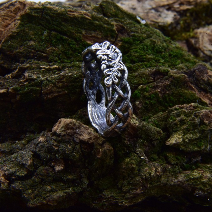 Delicate Silver Band with Intricate Weaving Design