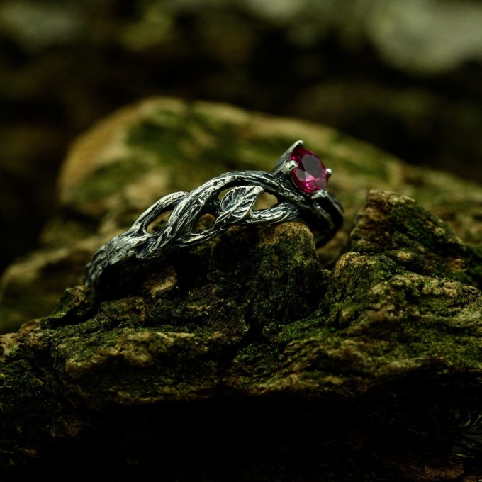 Scarlet Enchantment: Gothic Ruby Ring with Twisted Band
