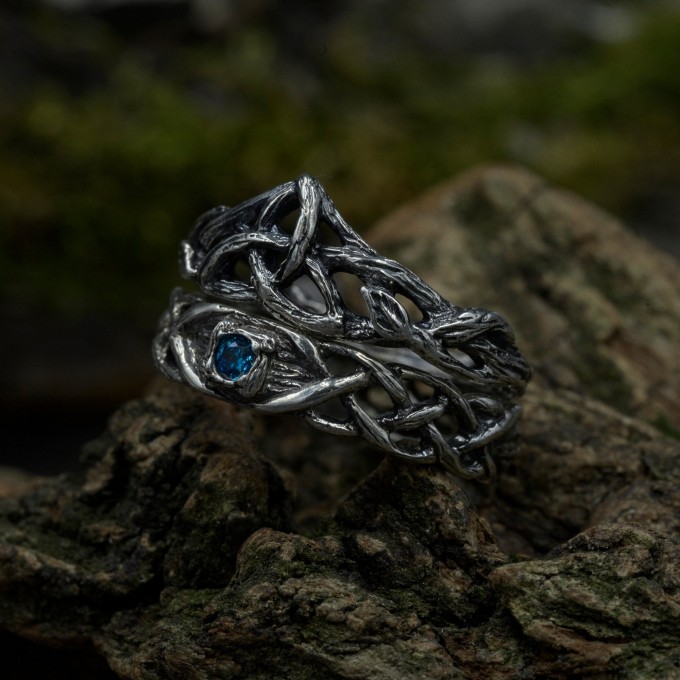 Gothic Blue Topaz Ring with Intricate Celtic Knot Motif