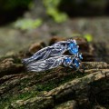 Blue Topaz Symphony: Sterling Silver Ring of Mystical Grace