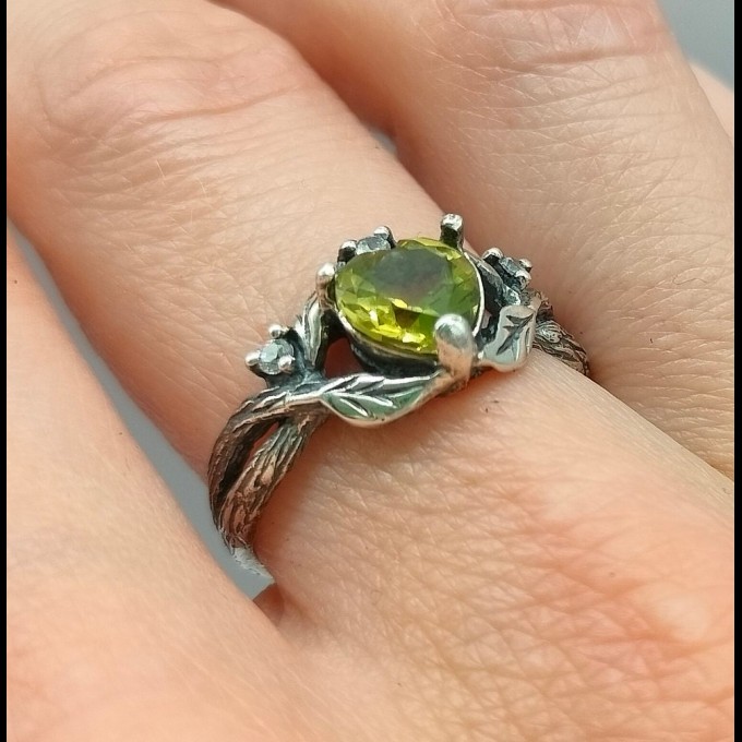 Gothic Silver Ring with a Vibrant Olivine Gemstone