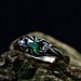Handcrafted Emerald Ring with Dark Forest Design