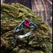 Intricate Silver Ring with Vibrant Ruby Gemstone