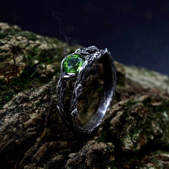 Emerald Flame: Gothic Peridot Ring of Strength