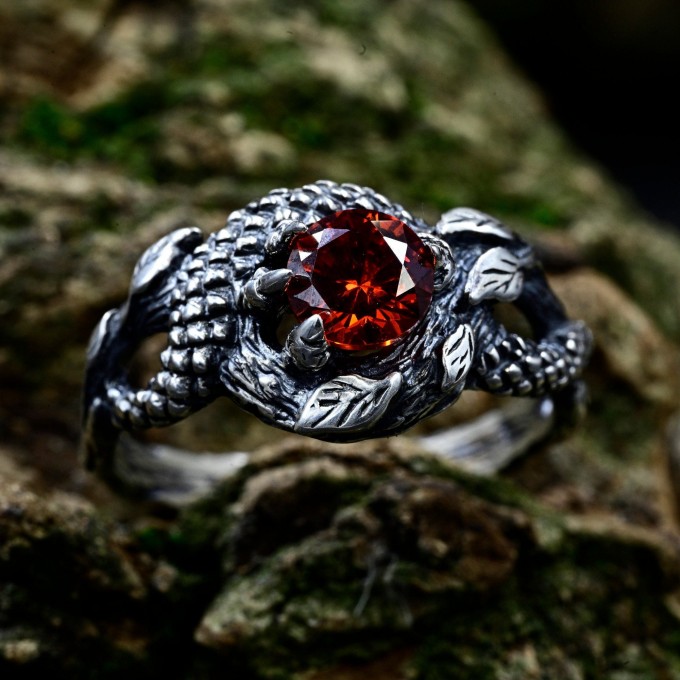 Silver Ring with Dragon Claw and Garnet Design